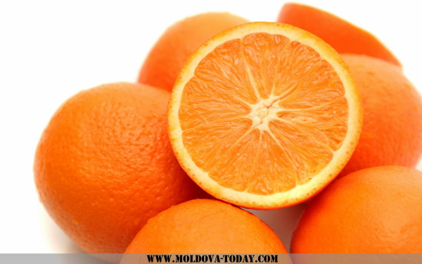 It is a lot of oranges on a white background