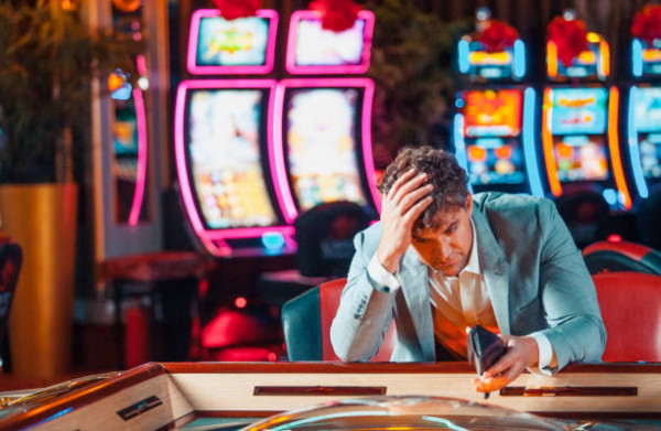 Man loosing his money in the casino